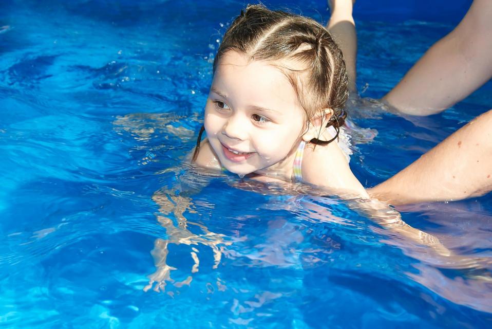 Little girl swimming