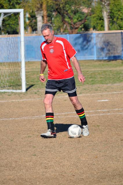 Men's Soccer Player Dribbling the Ball