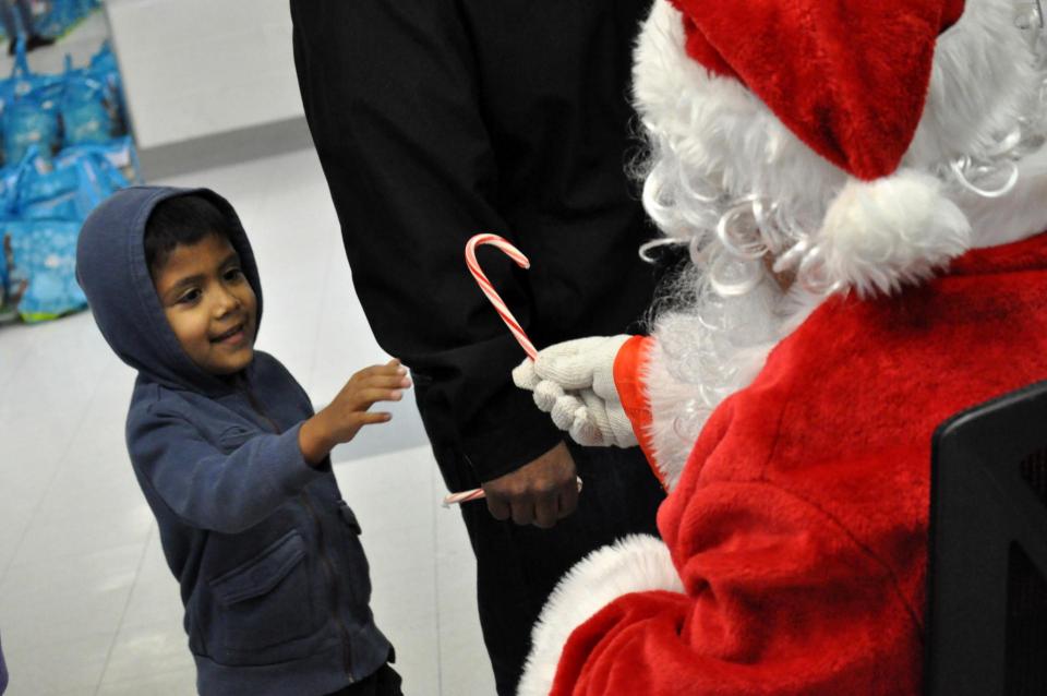 Boy meets Santa Claus