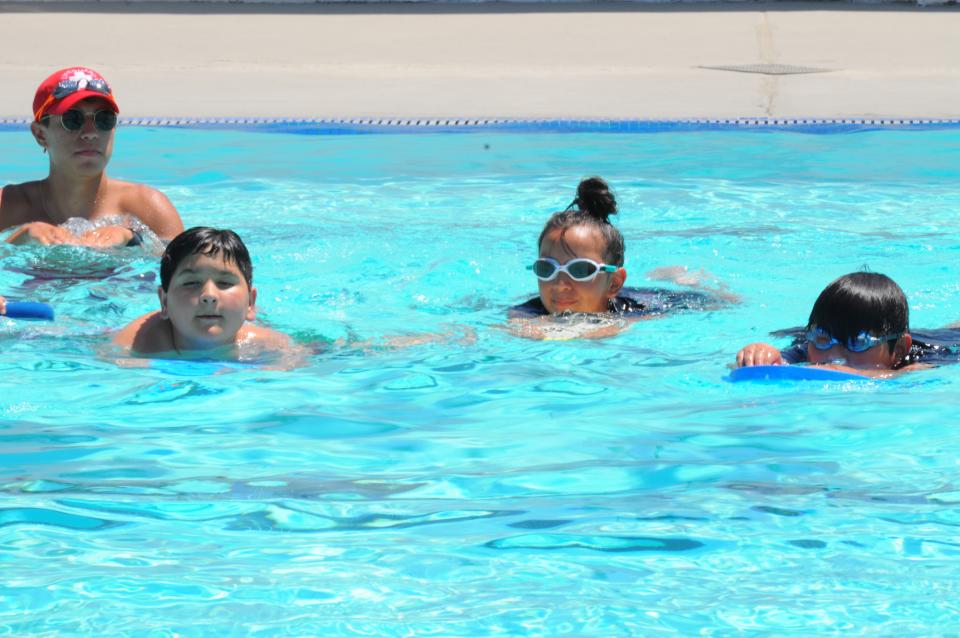 Grade school kids in swimming pool
