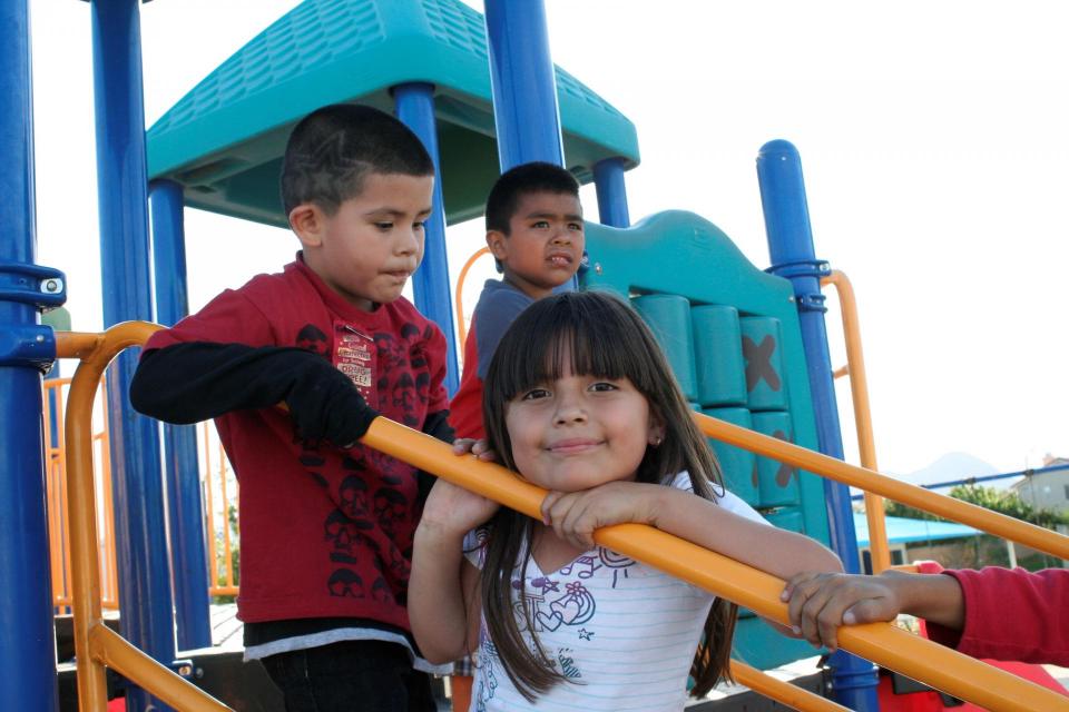 Kids on playground equipment