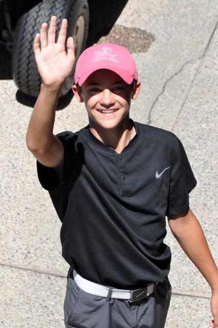 Photo of Braden waving to the camera 