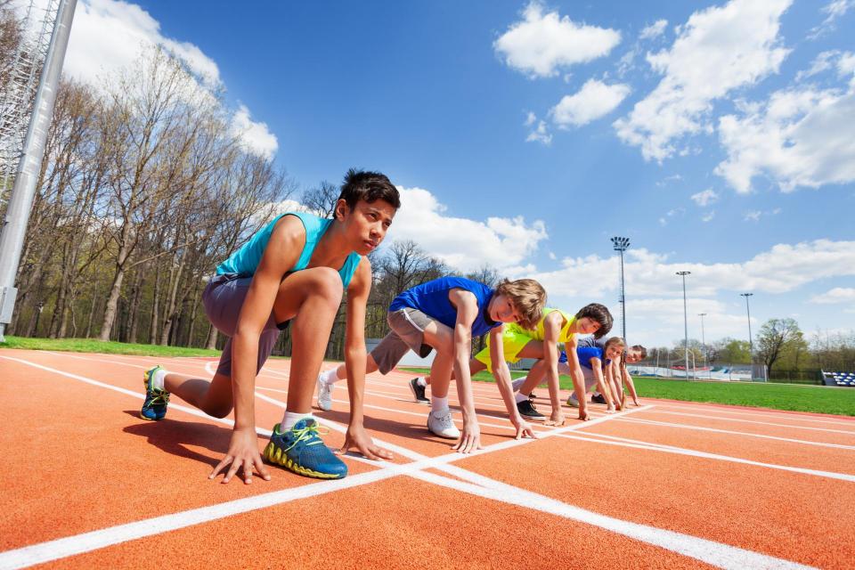 Teens at start line of a race