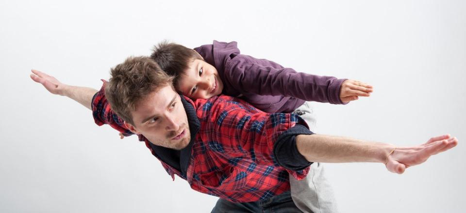Man and child playing