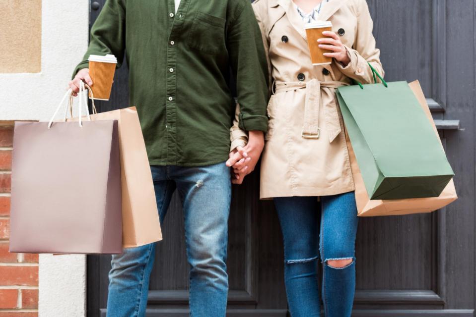Couple with shopping bags on a street