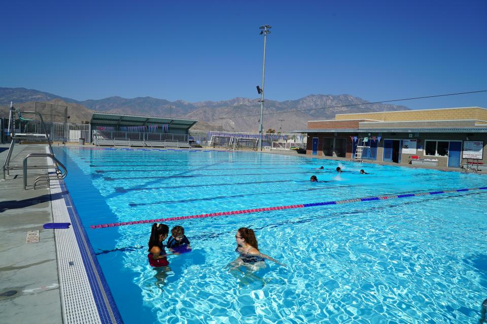 Adult man swimming in a pool