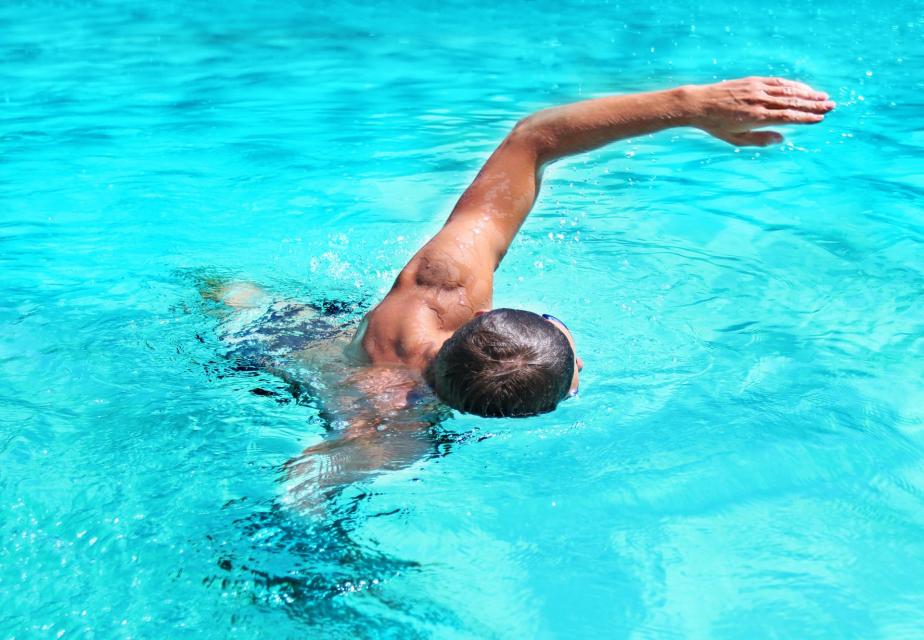 Adult swimming in a pool