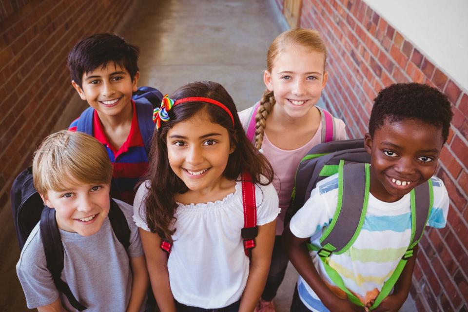 Five kids of various culture in a group