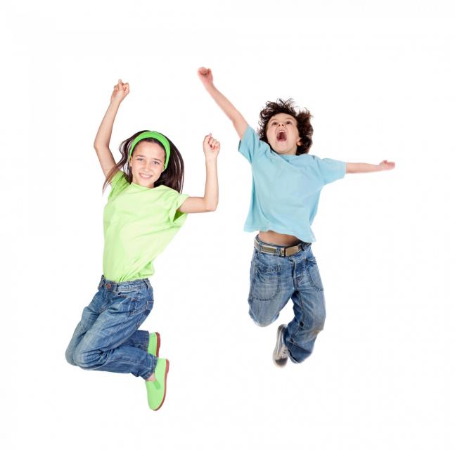Two kids jumping in the air