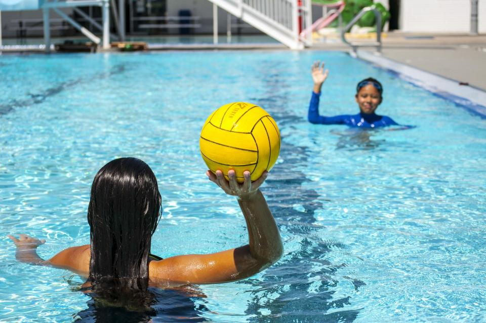 Photo of girls playing volleyball inside Pawley Pool