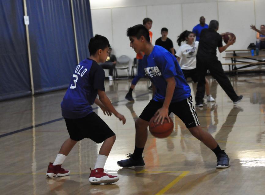 Youth playing basketball