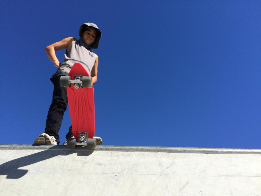 Photo of skateboarder ready to drop into the transition 