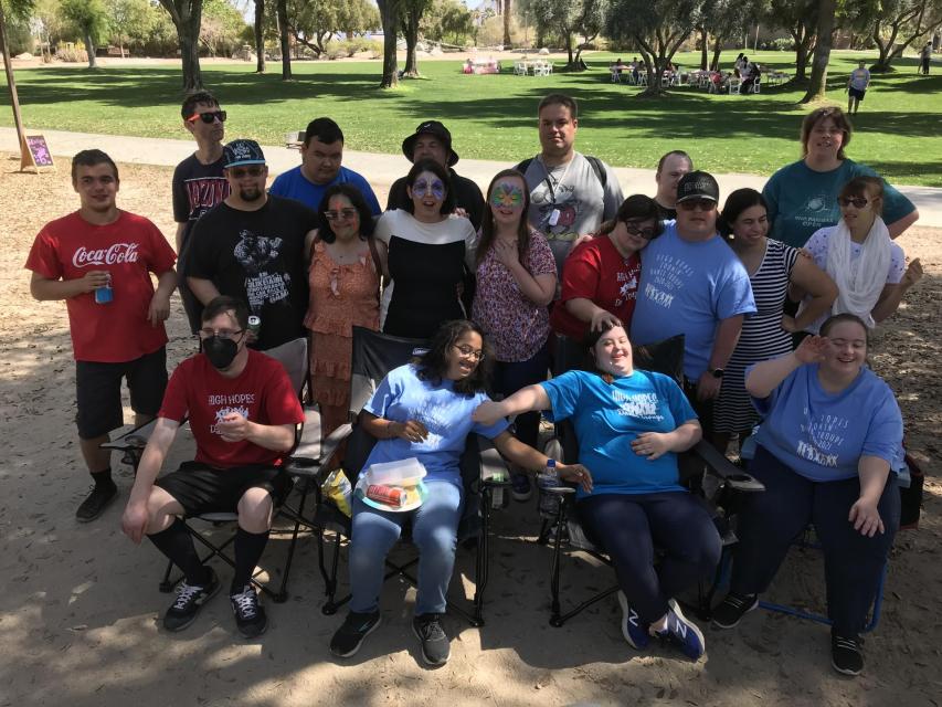 Group of adaptive sports participants outdoors at a park