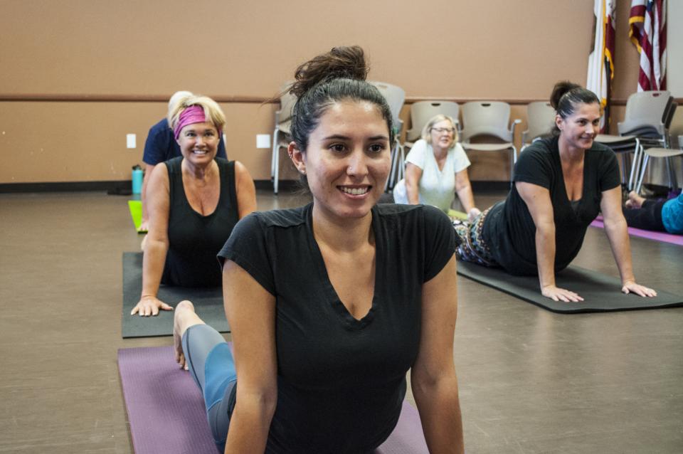 Photo of Yoga class students
